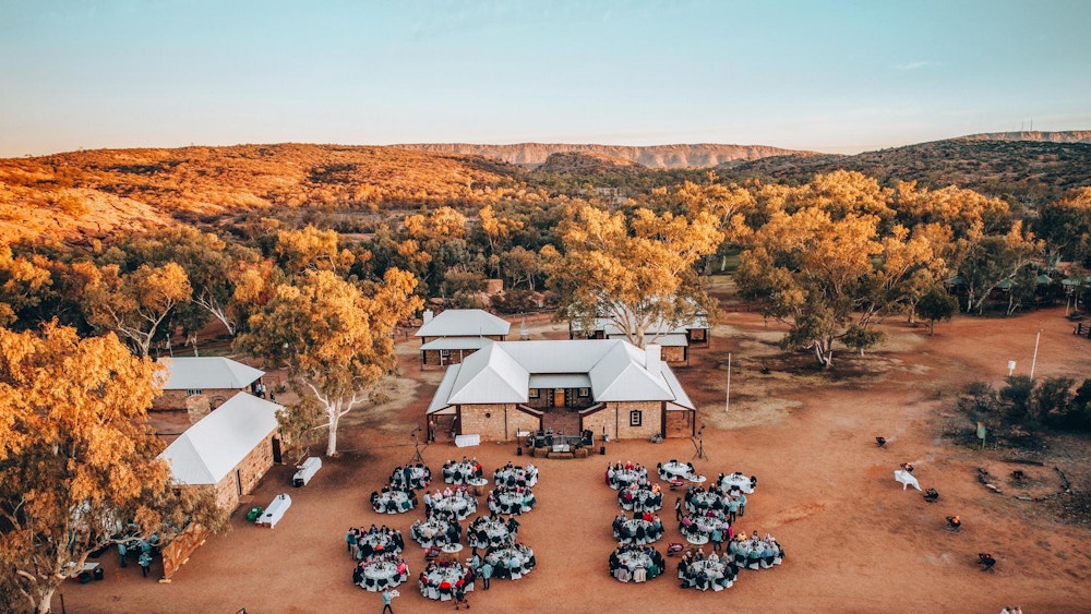 The Ghan expedition train crossing a vast Australian landscape