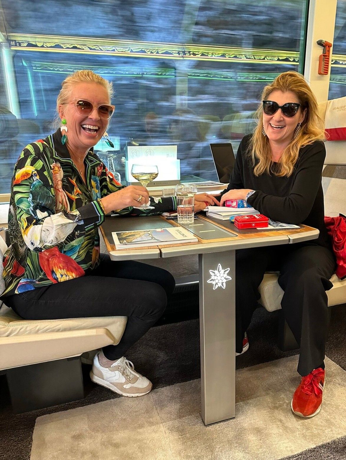 Dining at a panoramic table aboard the Glacier Express