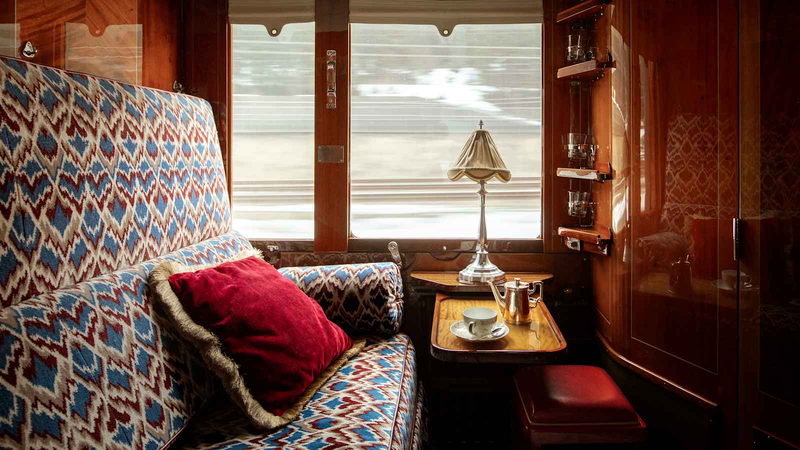 Overnight sleeper cabin illustrating a rail travel style with reservation requirements