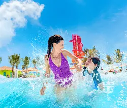 Family enjoying Royal Caribbean waterpark attractions