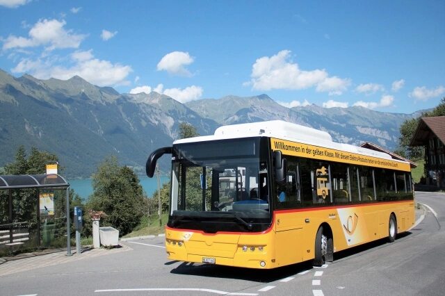 Swiss PostBus traveling through the Interlaken region