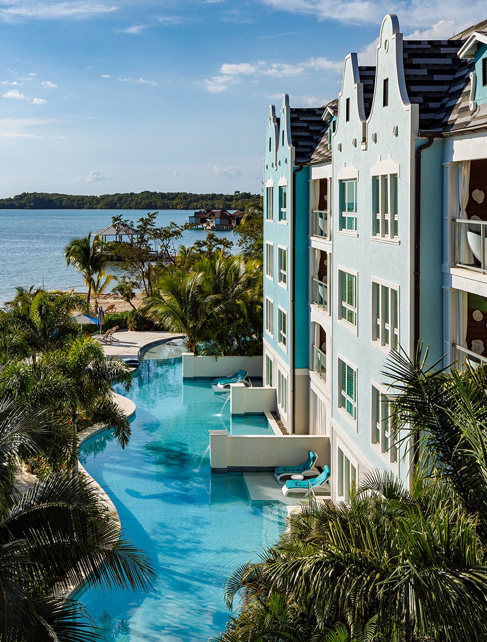 Destination wedding group celebrating together at a Sandals resort