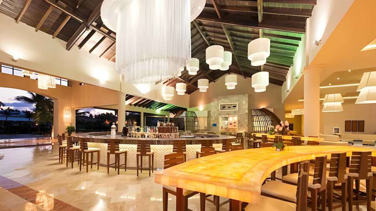 Official WestJet Vacations hotel lounge and dining area